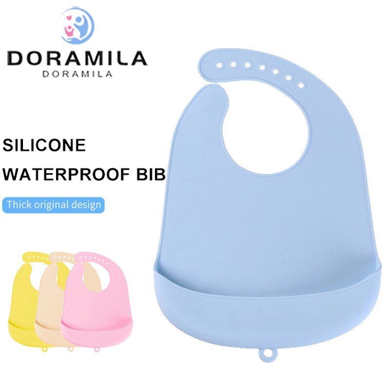 Babador impermeável do silicone do bebê da cor sólida com o avental de toalha da saliva do feijão dos bolsos projetado com o coletor largo profundo das migalhas