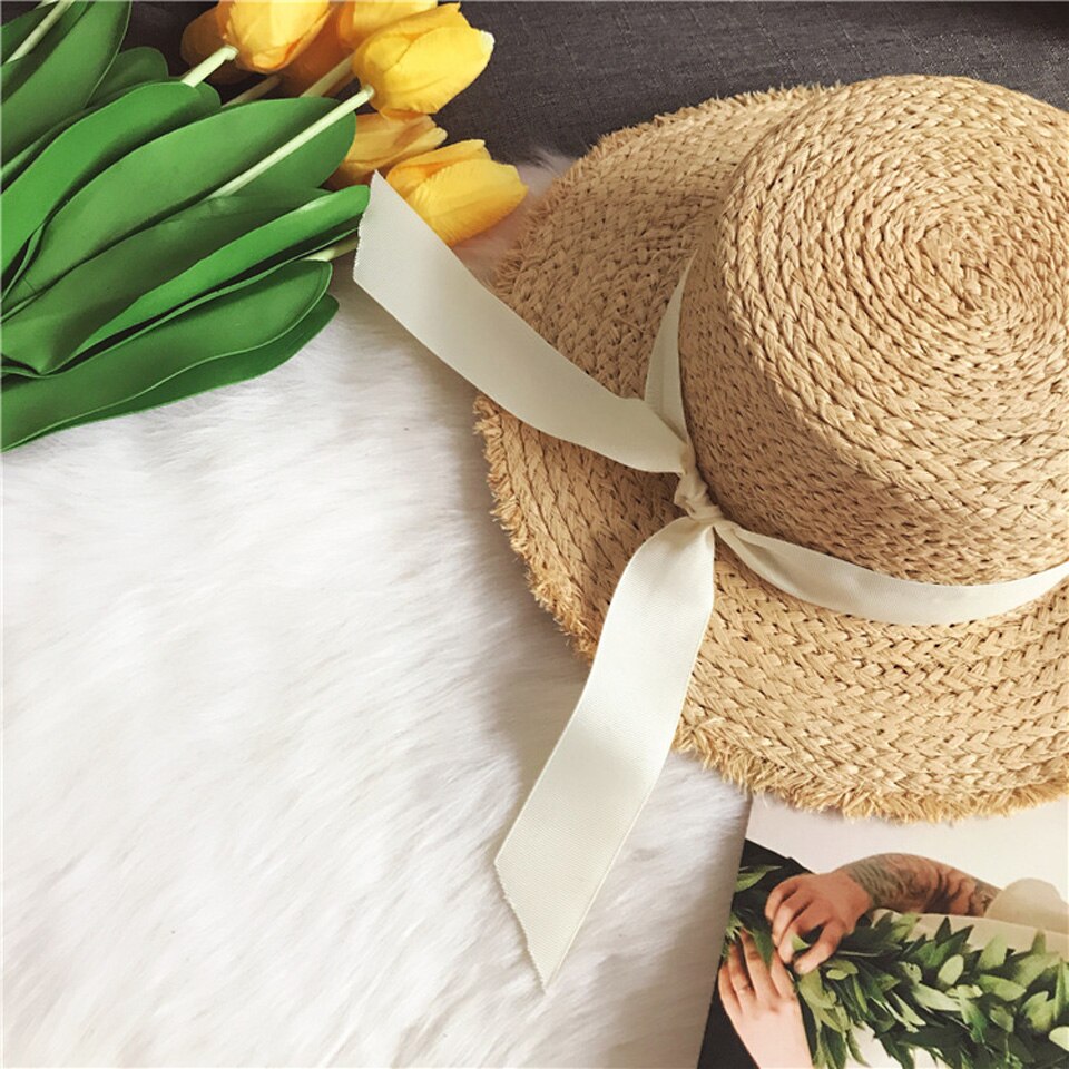 Kvinnor sommar strand raffia solhatt med band rosett raffiahatt temperament platta stråhattar dam båtägare solhatt raffia solhatt