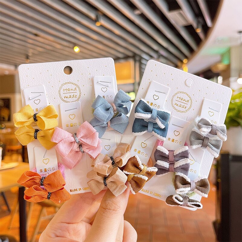 10 pz/lotto Bowknot accessori per capelli per bambini principessa ragazze Solid Dot fascia per capelli copricapo bambini corde per capelli elastici copricapo