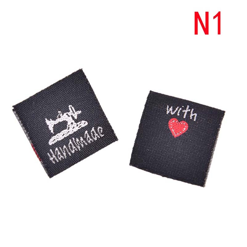 50 Uds. Tejidas a mano con Gato amor máquina de coser etiquetas de ropa en relieve etiquetas DIY etiquetas de bandera para accesorios de costura de prendas de vestir: N1