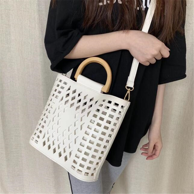 Femmes sacs sacs à main marques célèbres évider plage sac Bolsa Feminina bois poignée fourre-tout sacs sac à bandoulière en cuir synthétique polyuréthane sacs à main