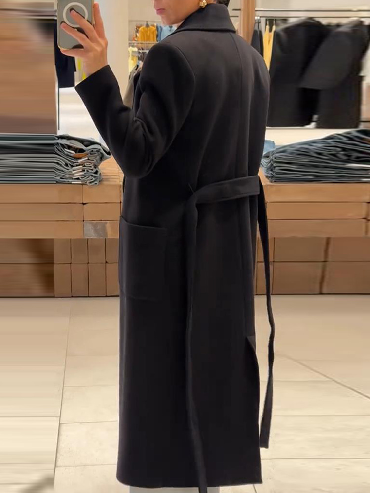 Elegante dames zwarte lange jas met riem Stijlvolle revers Veterschoenen Trenchcoat Herfst Winter Wolmix Bovenkleding Mode-outfit