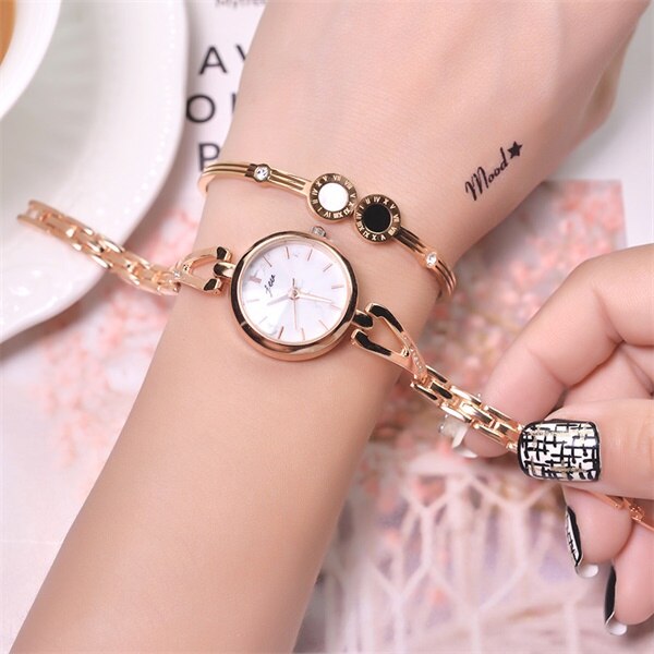Luxus Goldene Edelstahl Frauen Armbinde Uhren schneiden Oberfläche Marmor Zifferblatt Damen Armbanduhren Kleine Weibliche Uhr: Weiß