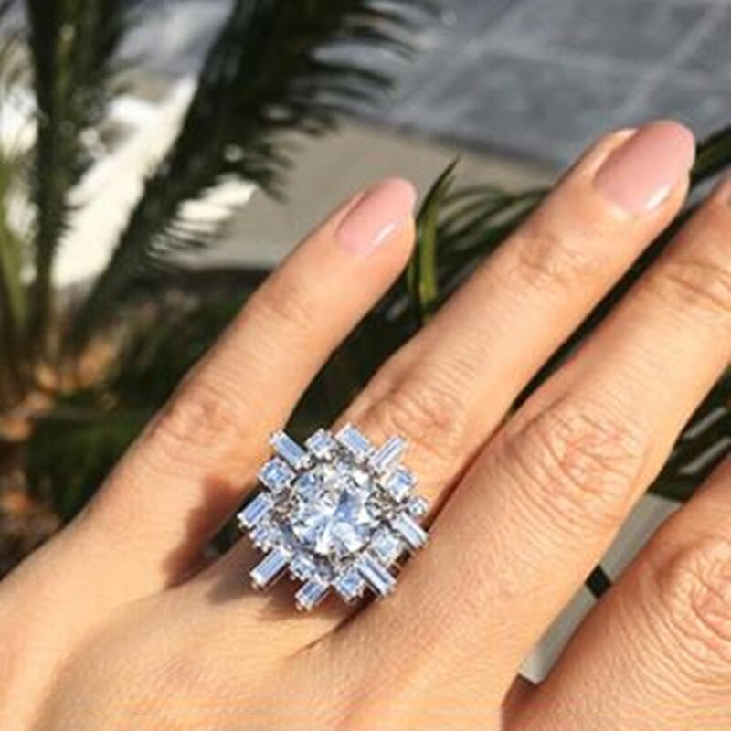Huitan luksus sølvfarve store runde cz geometriske form kvinder ringe forlovelsesforslag ringe til kvindelige smykker