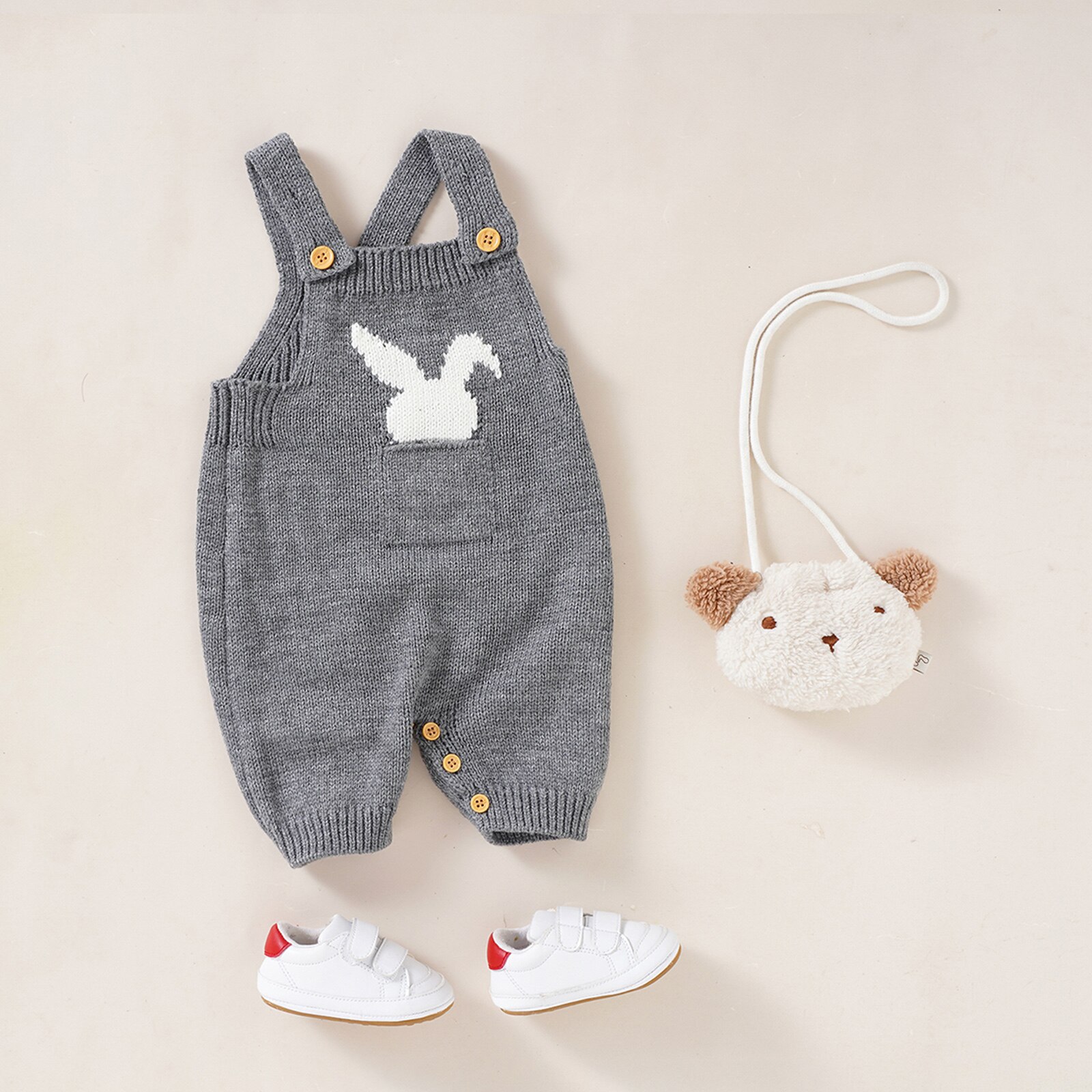 Oster-strickoverall für babys und kleinkinder, ärmellos, mit hasenmuster und vordertasche