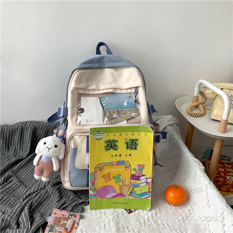 Mochila de Nylon impermeable de gran capacidad para mujer, bolso de viaje coreano para chica joven, bolsillo transparente, mochila escolar con hebilla de inserción, novedad de