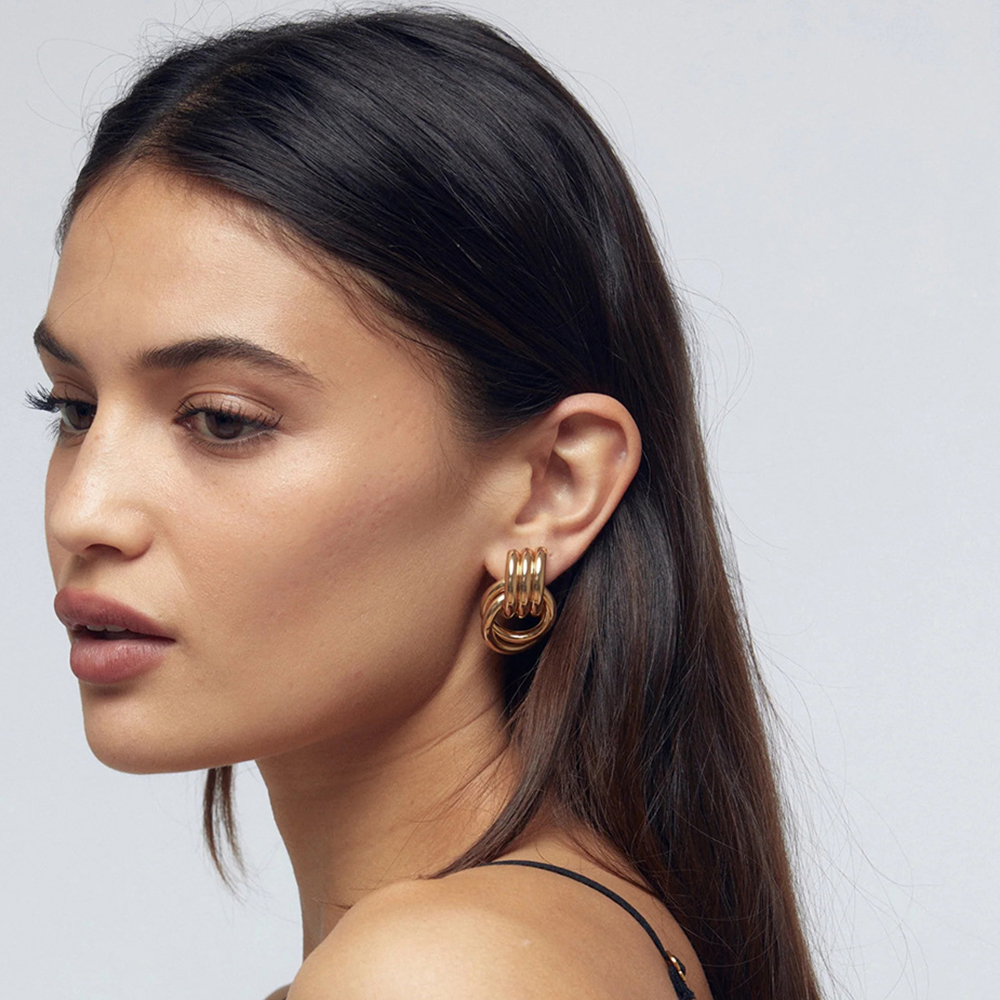 Pendientes geométricos con textura de acero inoxidable para mujer, aretes con nudo torcido chapado en oro de Metal liso, joyería Vintage llamativa