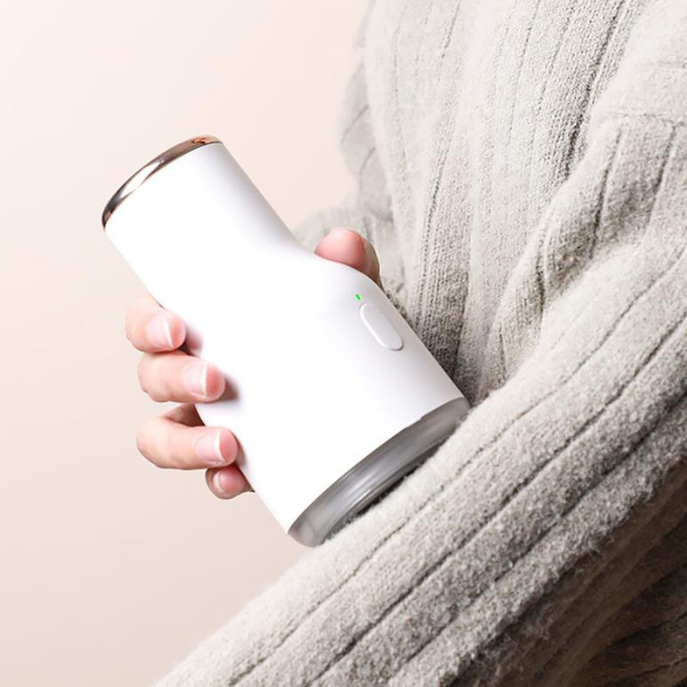 Rechargeable hair ball trimmer Hair ball trimmer long - life hair shaving machine to remove the ball magic hair shaving device