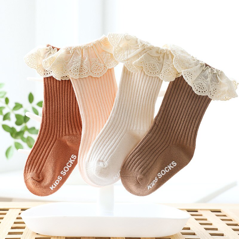Calcetines de encaje de princesas para niñas, medias con pegamento antideslizante de tubo mediano, medias tejidas con volantes y ojales para niños