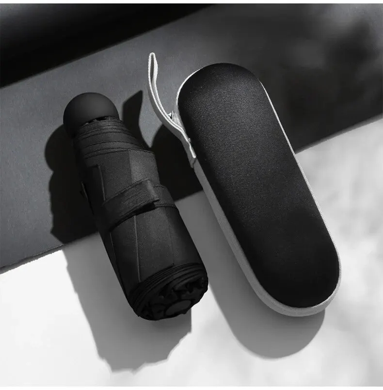Paraguas cápsula de color sólido: pequeño parasol portátil de doble uso y protección contra la lluvia para mujeres: Negro