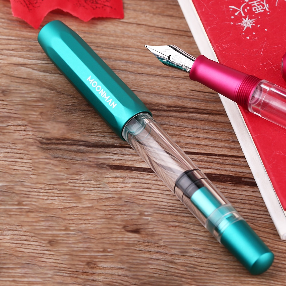 Pluma fuente de Metal Moonman T1 Piston de gran capacidad, pluma de tinta F Nib, caja Original