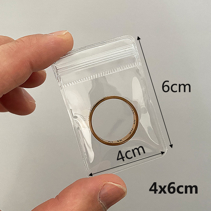 Sacchetti per gioielli in PVC trasparente da 20 pezzi sacchetti sacchetto di immagazzinaggio carino anti-ossidazione per orecchini collana braccialetto Schermo sacchetto di imballaggio: bianca