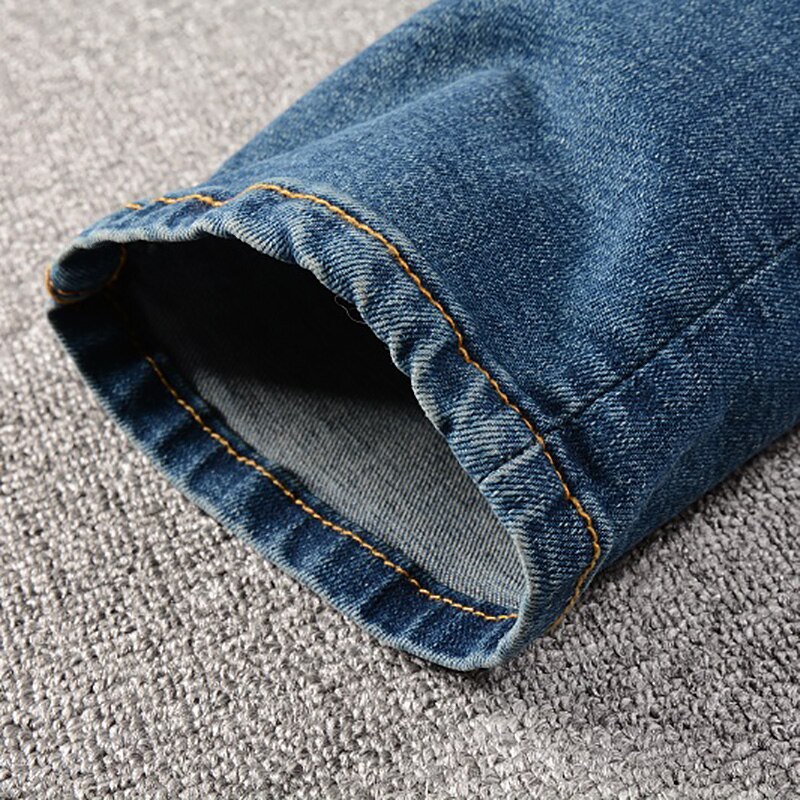 Jeans Patch da uomo con stampa Bandana Paisley fori Streetwear pantaloni strappati in Denim elasticizzato strappato pantaloni Slim affusolati