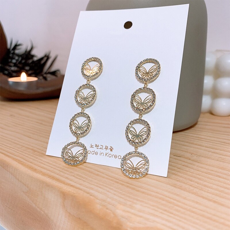 MENGJIQIAO coréen mignon délicat rond creux papillon Zircon boucles d'oreilles pour femmes filles Micro pavé Pendientes bijoux