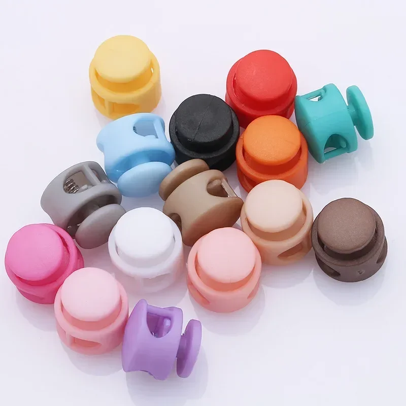 10 Uds. Topes de cordón coloridos, cerraduras redondas de plástico, tapones antideslizantes de resorte de Metal, accesorios de costura de ropa DIY