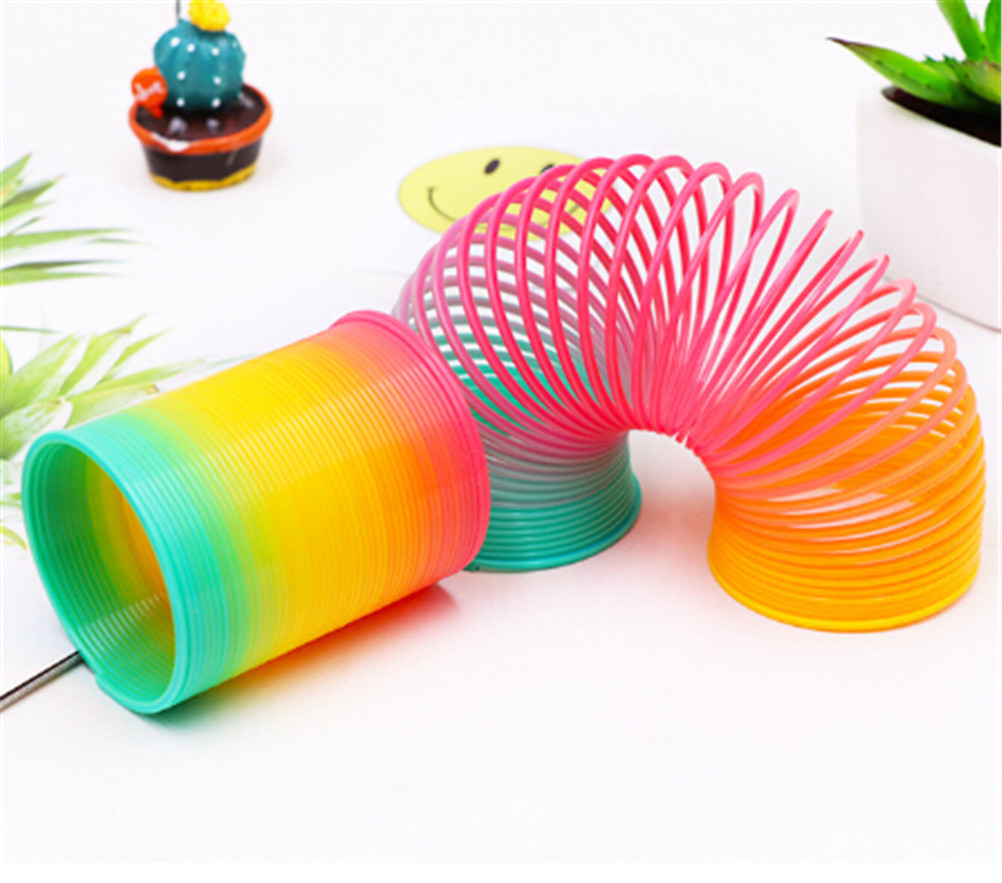 Creativo per bambini Educativi Arcobaleno Primavera proteano Arcobaleno Colorato Cerchio Pieghevole di Plastica Molla Elicoidale