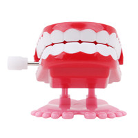 Foråret wind-up jump tand tandlegetøj dental wind-up dejlige foråret plast legetøj jump tænder kæde til børn: Springende tænder