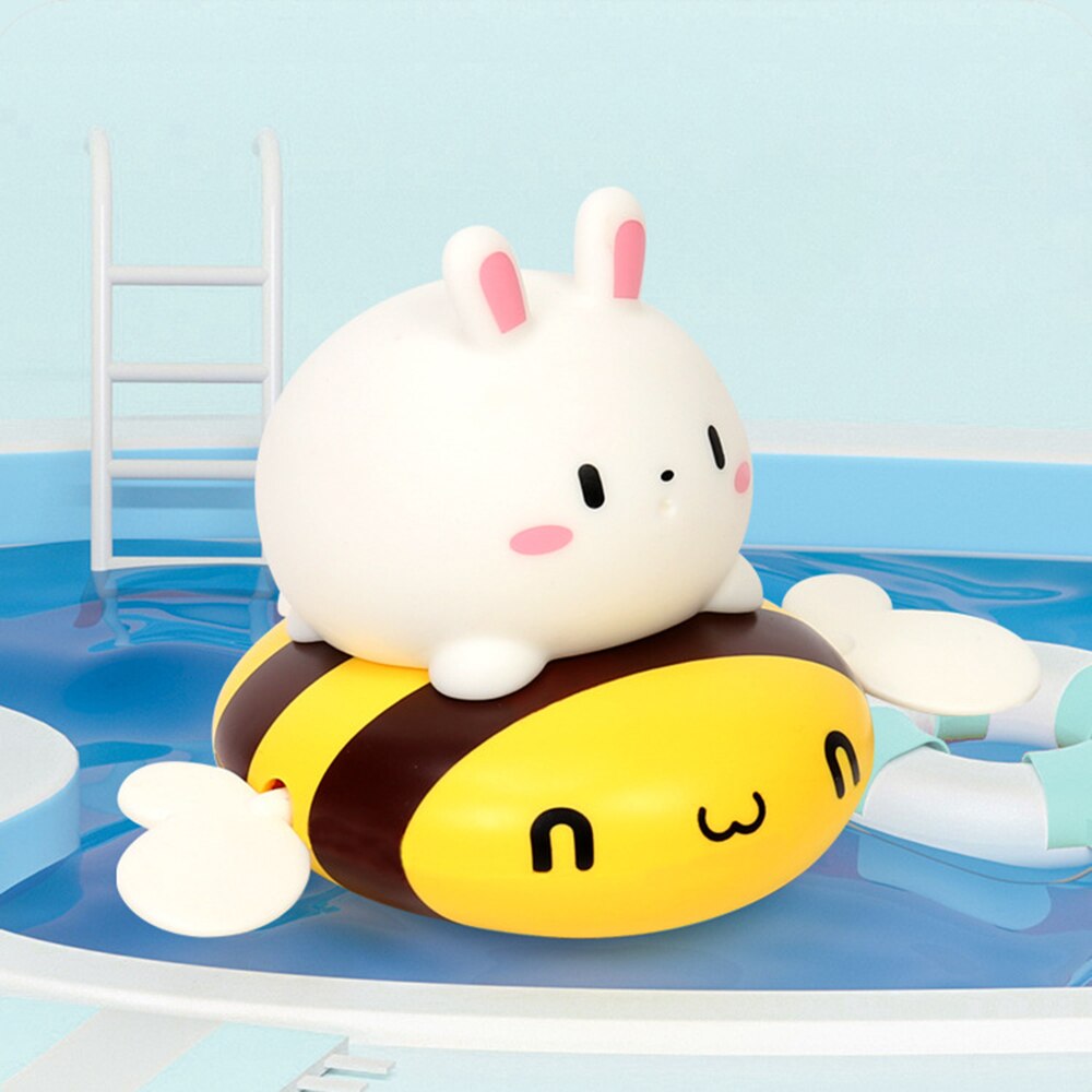 Niedliches spielzeug für die babyparty: aufziehmechanismus für tierfiguren, interaktives wasserspielzeug mit quetschfunktion für jungen und mädchen, robust und langlebig  b99: 02