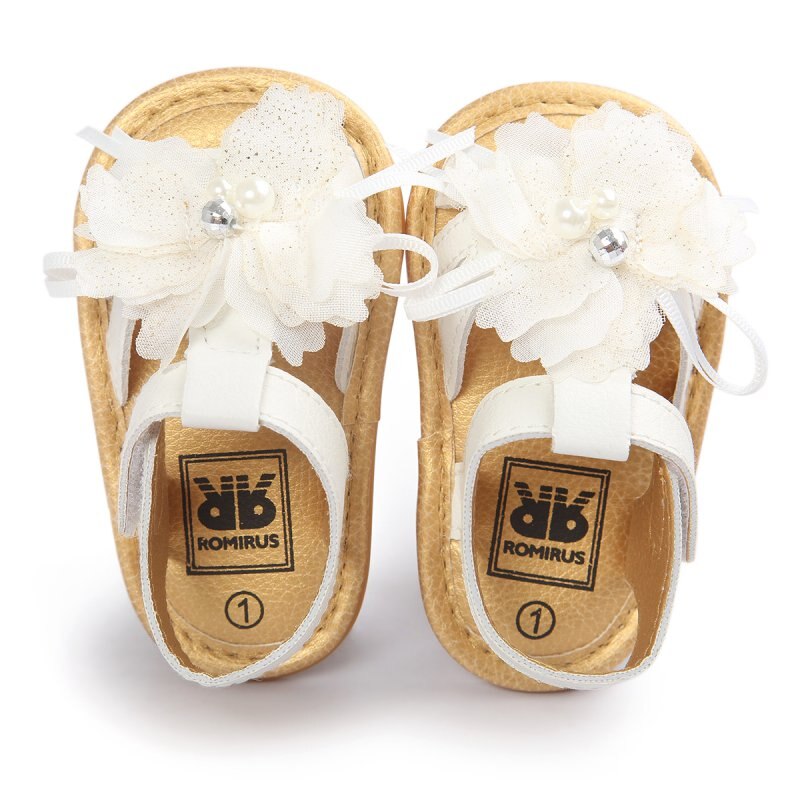 Fredda di proprietà Del bambino Sandali Scarpe Skidproof bambini piccoli infantile Del bambino Pattini Del Fiore di Cuoio dell'unitàÀ di elaborazione Sandali Nuovo