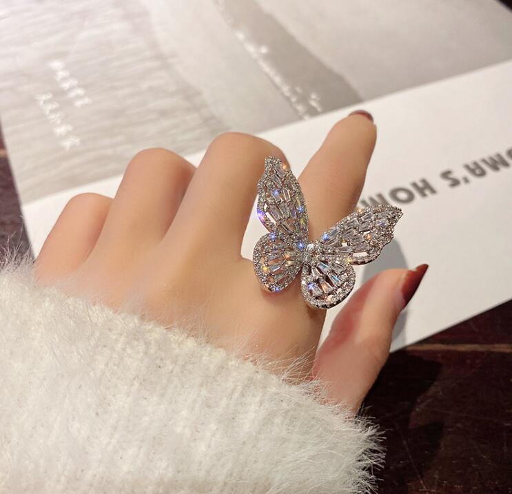 Femmes de luxe à la brillant strass boucle d'oreille gemme papillon anneau collier ensemble de bijoux