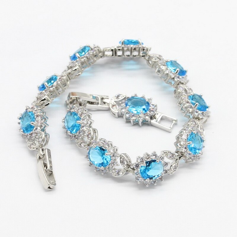 Zilveren sieradensets met blauwe opaal voor dames, kettinghangers, oorbellen en hemelsblauwe kristallen zirkonia armbanden