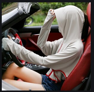 Sommer er kvindelige armærmer på bilchauffører beskyttet mod sol. silkebelagte arme beskytter mod solskoldning til cutroen bil: Sølv