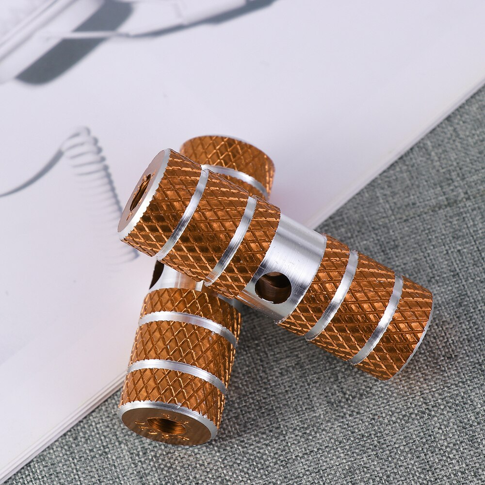 Een paar aluminiumlegering fiets cilinder stoel as stunt pegs voor mountainbike (zwart): Gouden