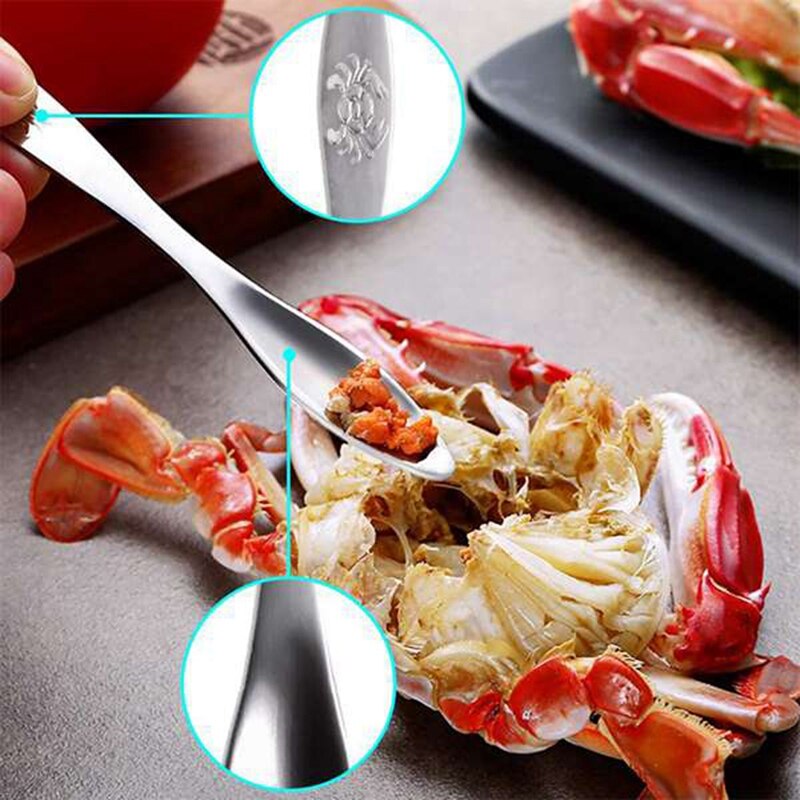 the 7-Piece Seafood Tool Set Includes 2 Crab Crackers, 2 Lobster Shells, 2 Crab Forks/Pickles and 1 Seafood Scissors