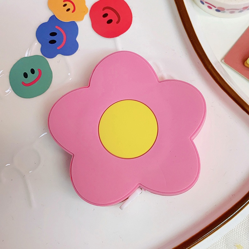 Ruban à mesurer rétractable portable et mignon, outil de couture, ruban à mesurer souple pour mesurer le corps: Un