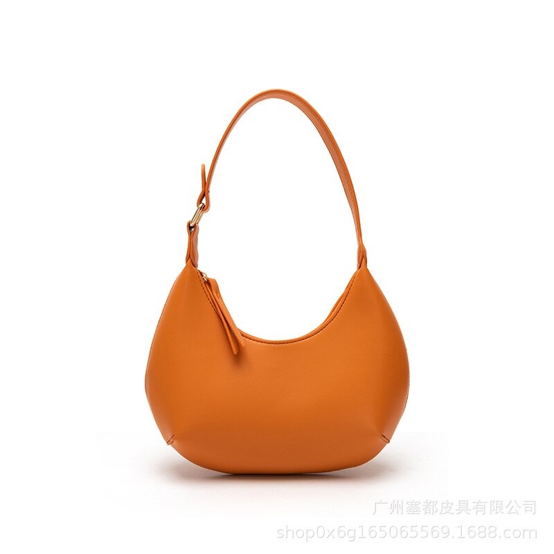 2021 New Trendy Spring Y2k Stereo irregolare ascella Baguette borsa da donna moda semplice trasporto a mano pendolarismo carino PU Jerry: Orange