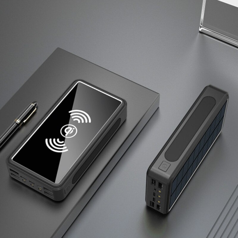 80000 mah stor kapacitet trådløs mobil opladning solar mobile power 4 usb oplader eksternt batteri velegnet til alle smartphones: Sort