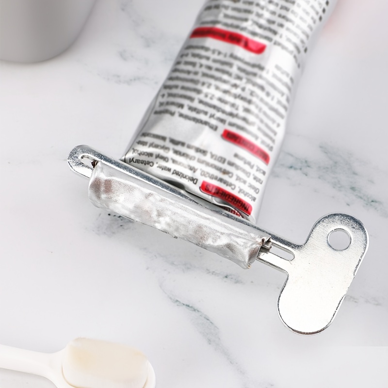 Spremi dentifricio in acciaio inossidabile, spremiagrumi per capelli, vernice ad olio, dispenser rotante per unguenti, cosmetici, accessori da bagno