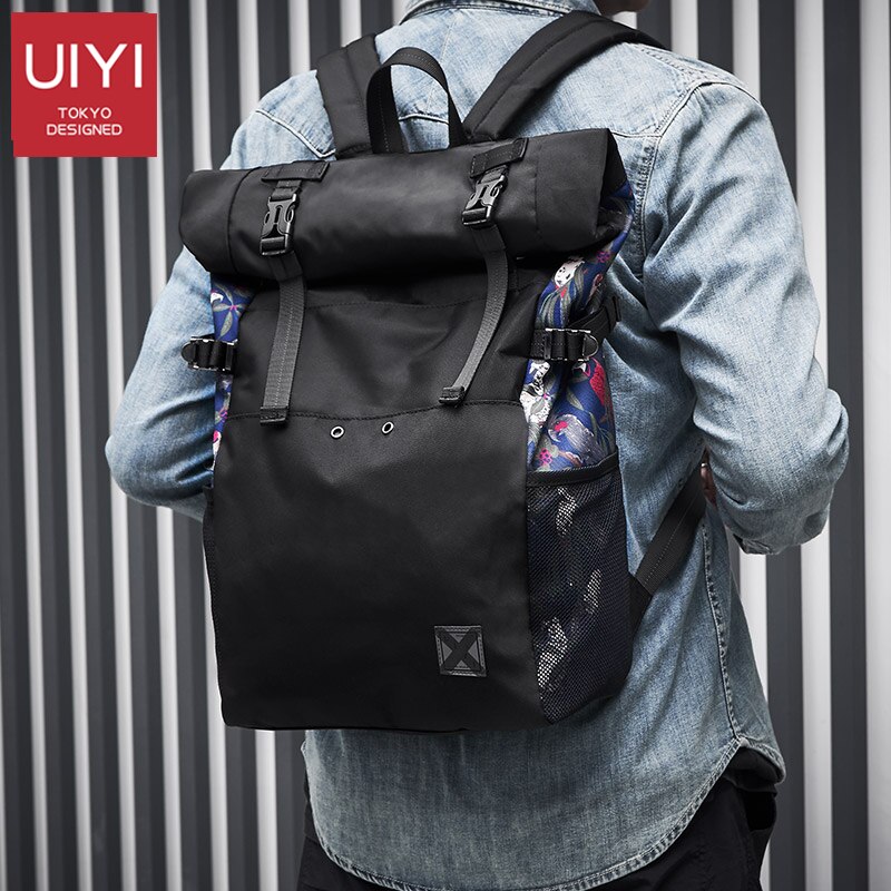 UIYI marca Coreana tampa do rolo de 15 polegada de viagem saco de escola mochila de esportes casuais saco dos homens laptop mochila mochilas à prova d' água