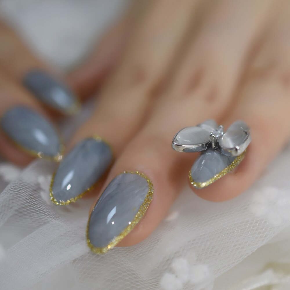 Legeret sommerfugl nail art falske negle marmor medium stilleto tryk på fingernegle med guld streg