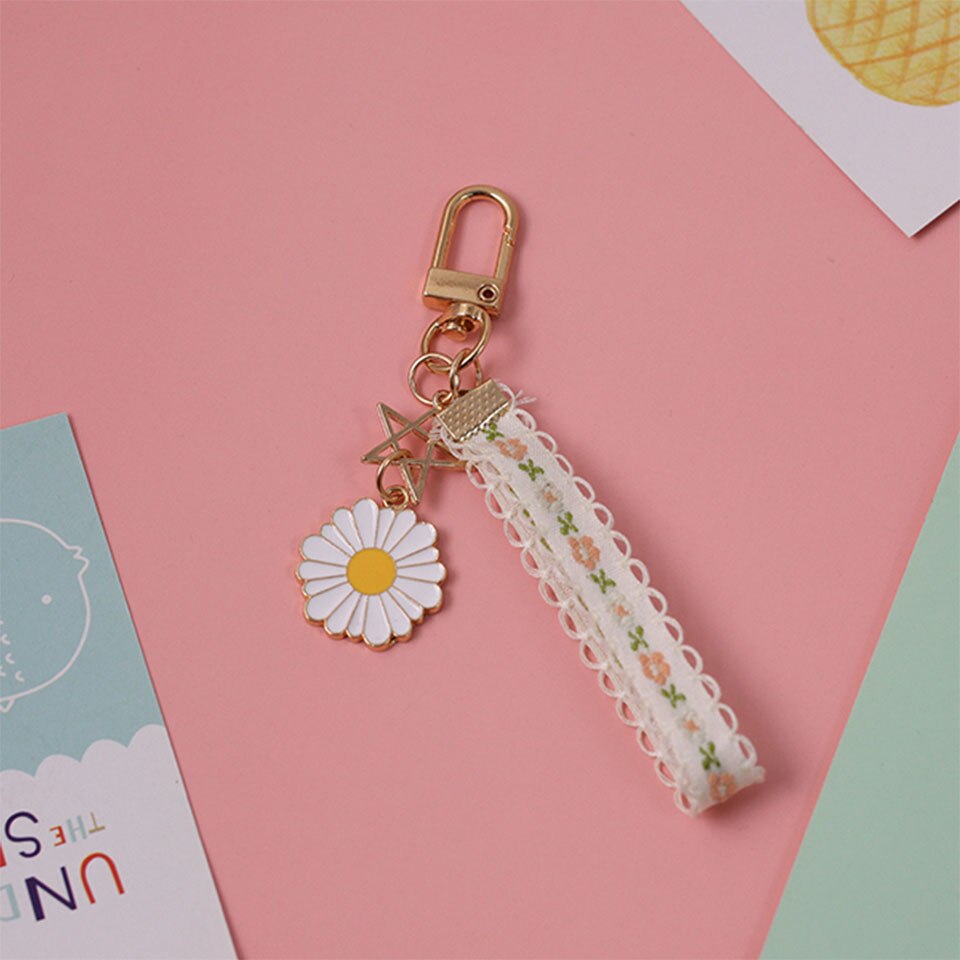 Söt tusensköna blomma svett färsk spets smart telefonrem snoddar för iphone samsung dekor mobiltelefon handledsrem rep telefon charm