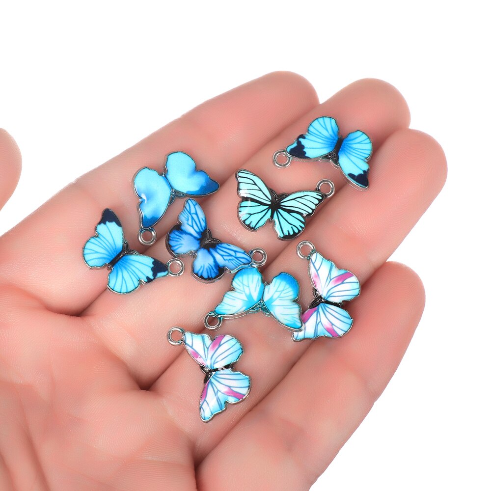 Colgantes de mariposa de esmalte azul, accesorios de joyería hechos a mano, 10 piezas