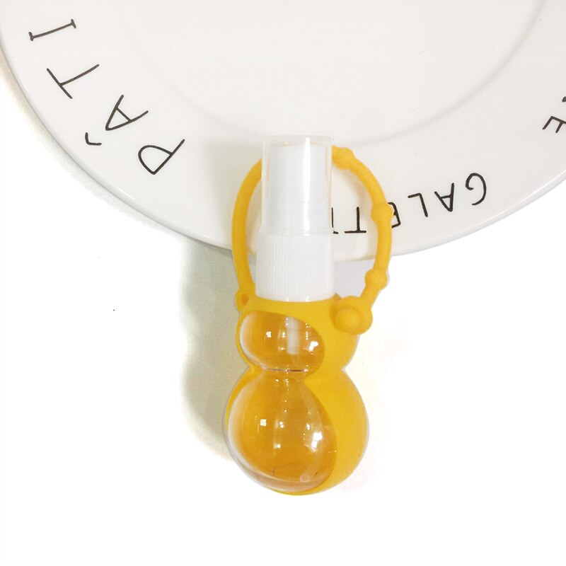 Mini botella portátil de Gel desinfectante de manos, cubierta de viaje extraíble, colores aleatorios, dibujos animados, 30ml, 1 unidad: YL