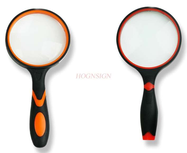 magnifying equipment Holding a magnifying glass 10 times for the elderly to read and observe the plant student