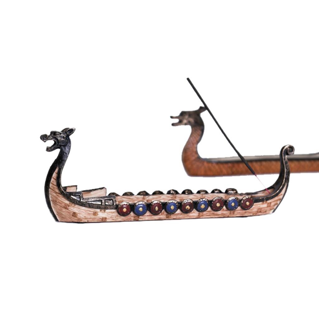 Hartsi lohikäärme viking -veneen koristeena festivaalin akvaarion koristeena