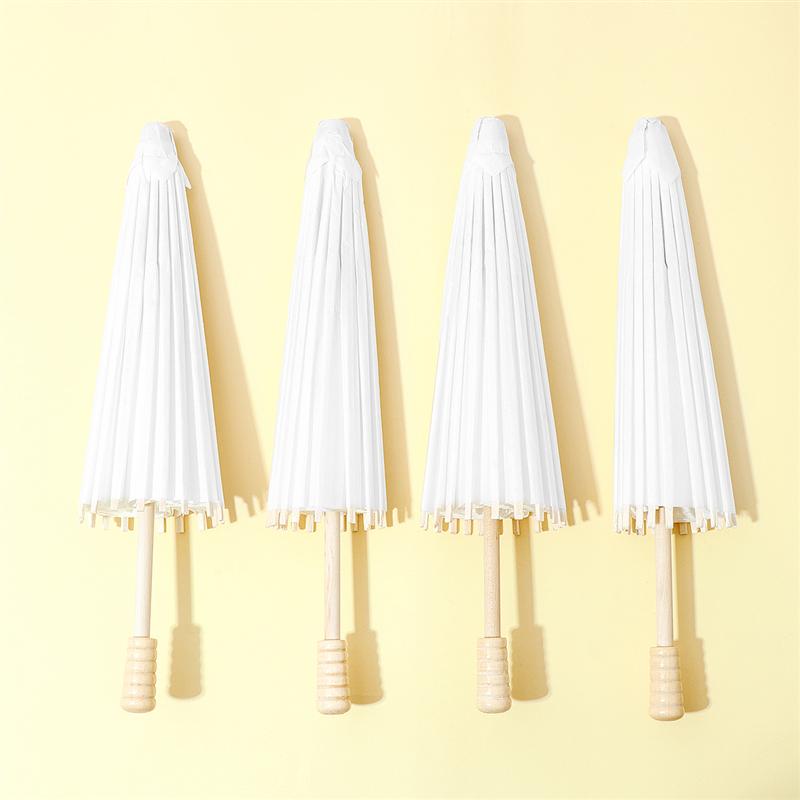 4 stuks Wit Papier Parasol Paraplu Chinese Japanse Papier Paraplu Bruiloft Decoratie Diameter 30cm Willekeurige Paraplu Handvat Stijl