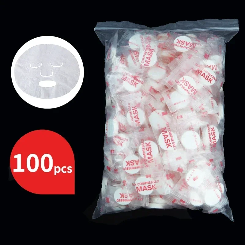 100 st engångs komprimerade ansiktsmasker bärbara resor non-woven ansiktsmasker hudvård bomullsinslagna masker papper