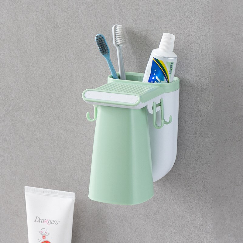 Soporte de cepillo de dientes de plástico para el hogar, colgador sólido para productos de baño, perforación, pasta dental, compresión,: Verde
