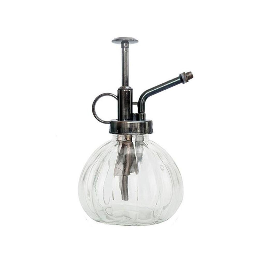 Retro glazen spuitfles, planten, bloemen, waterkan, tuinsproeier, pomp, mist, gieter, pot: Heldere pompoen