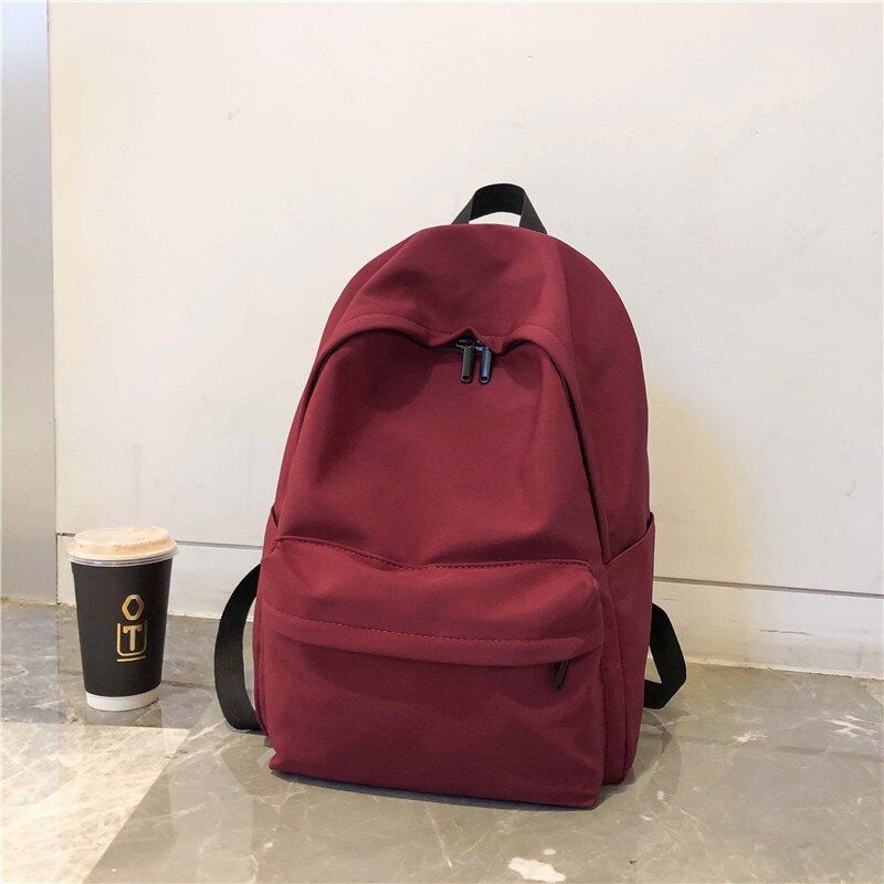 HOCODO Solid Canvas Backpack For Teenagers Women Casual Large Capacity School Bag Simple College Wind Travel Backpack Mochila: Red