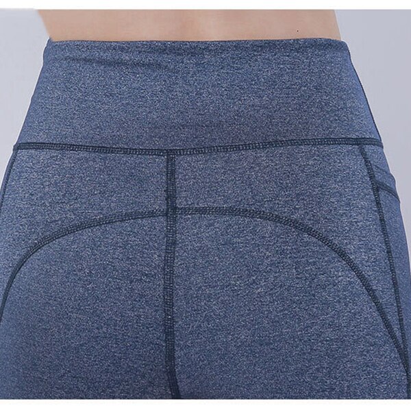 Yogashorts med hög midja för löparbikershorts för kvinnor med fickor