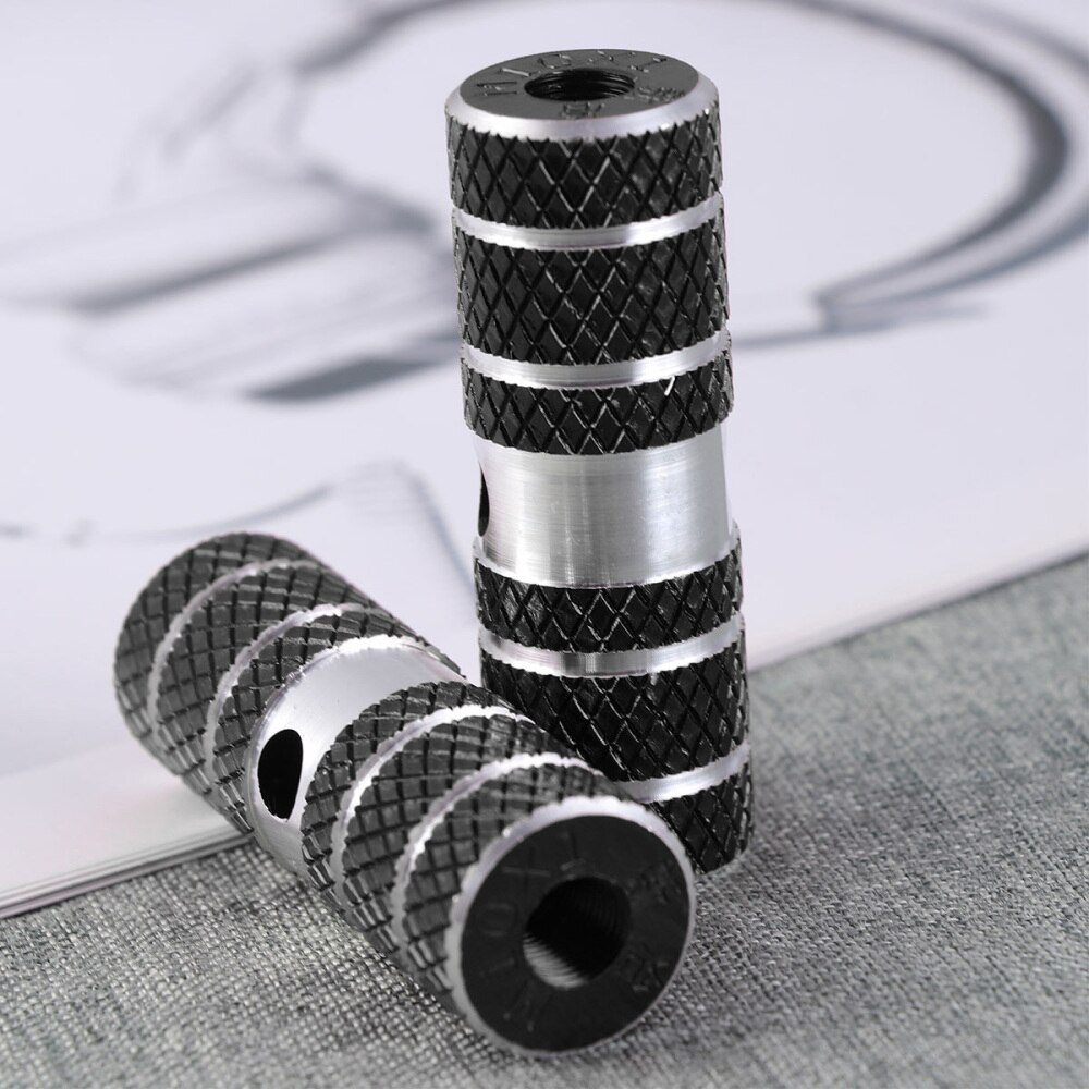 Een paar aluminiumlegering fiets cilinder stoel as stunt pegs voor mountainbike (zwart)