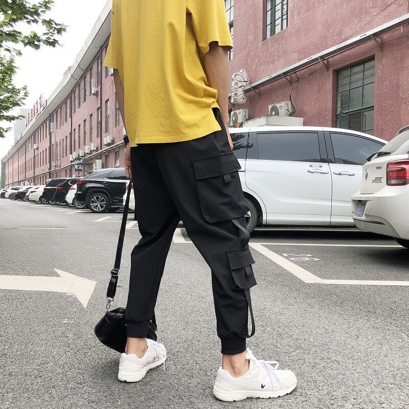 Pantalones Cargo de estilo Hip Hop para hombre, peto holgado con múltiples bolsillos, pantalón de ocio para trotar, ropa de calle, pantalones de cintura elástica, novedad de