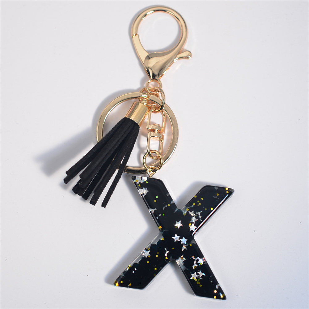Schwarze Initialen A-Z Schlüsselanhänger Glitzer Stern Pailletten Harz Buchstaben Schlüsselanhänger mit Quaste für Frauen Tasche Ornamente Charm Autoschlüsselhalter