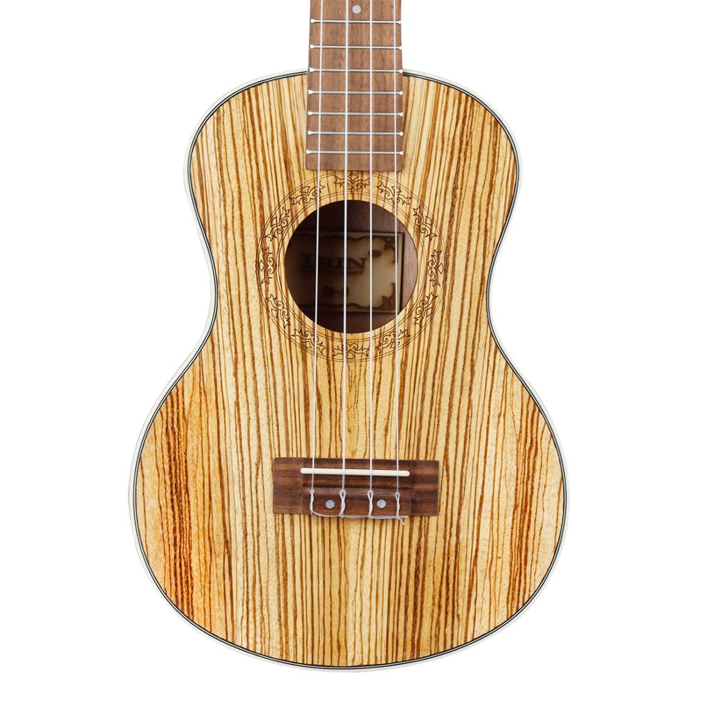 IRIN zebra drewno ukulele 21/24/26 Cal mała gitara akustyczna z worek strunowy Capo akcesoria robić paska zestaw 4 struny Ukelele