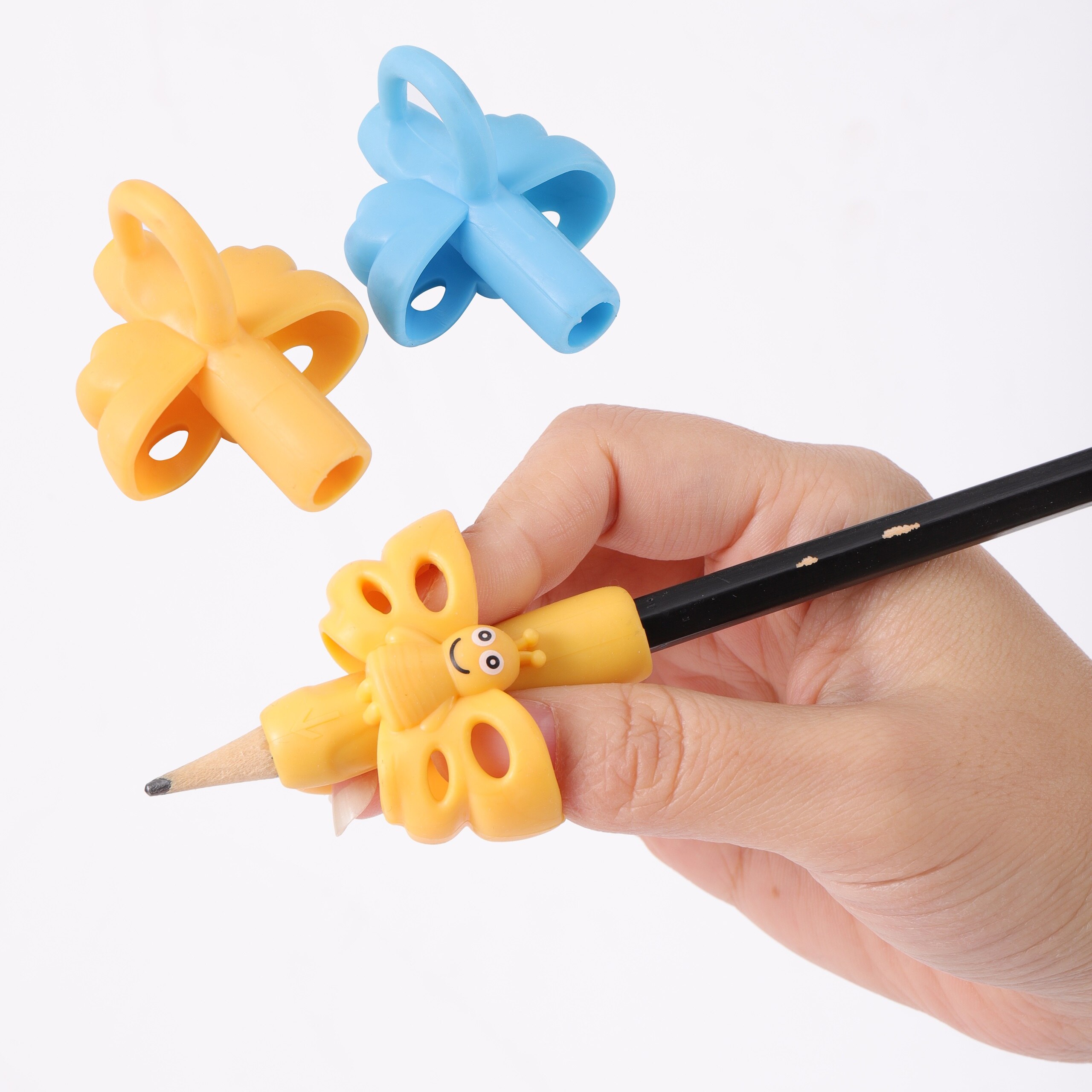 Stylo correcteur de Posture pour enfants, 2 pièces, support de stylo d'écriture bleu jaune en option, dispositif d'aide à la Correction de la Posture pour étudiants